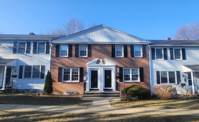 view of front facade with brick siding