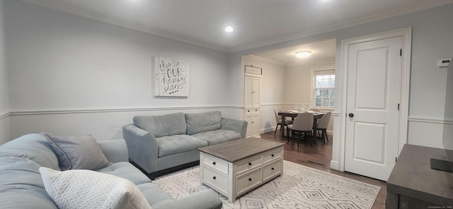 living room featuring visible vents, recessed lighting, crown molding, and wood finished floors