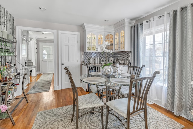 dining space featuring light wood-style flooring