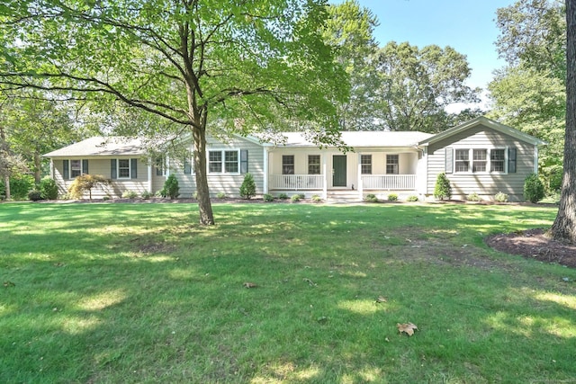 view of front of property with a porch and a front yard