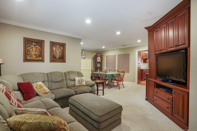 living area with recessed lighting, light colored carpet, baseboards, and ornamental molding