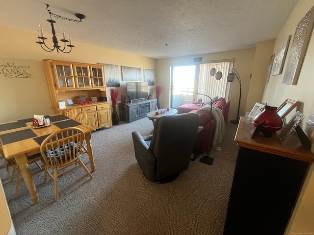 living room with a textured ceiling and carpet floors