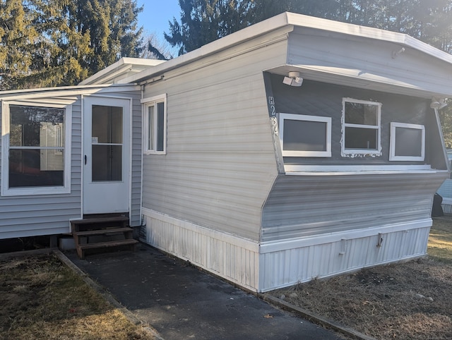 view of home's exterior featuring entry steps