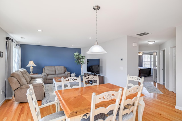 dining space featuring visible vents, recessed lighting, baseboards, and light wood-style floors