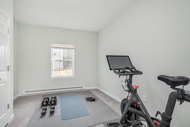 workout area with carpet flooring, baseboards, and baseboard heating