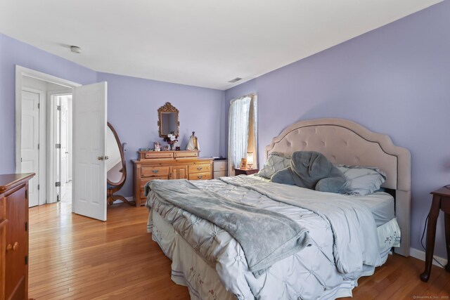 111 Georgetown Dr, Watertown, CT 06795 - bedroom featuring visible vents, baseboards, and light wood finished floors