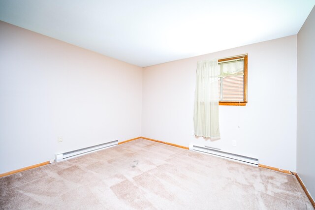 27 Mountain View Dr, East Hartford, CT 06117 - carpeted empty room featuring a baseboard radiator