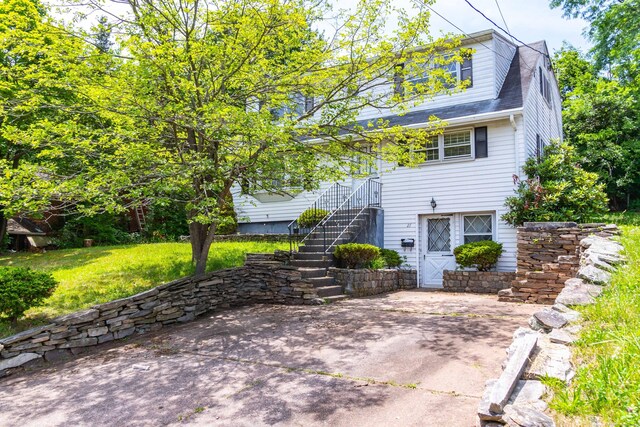 27 Mountain View Dr, East Hartford, CT 06117 - view of front of house featuring stairway and a front yard