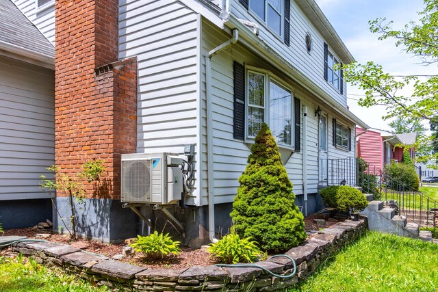 27 Mountain View Dr, East Hartford, CT 06117 - view of home's exterior with a cooling unit