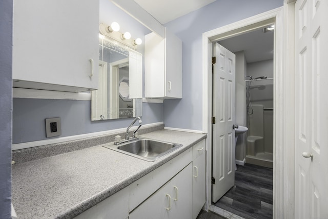 interior space with wood finished floors and vanity