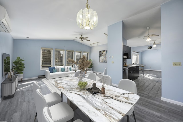 dining space with baseboards, lofted ceiling, dark wood-style flooring, a wall mounted air conditioner, and ceiling fan with notable chandelier