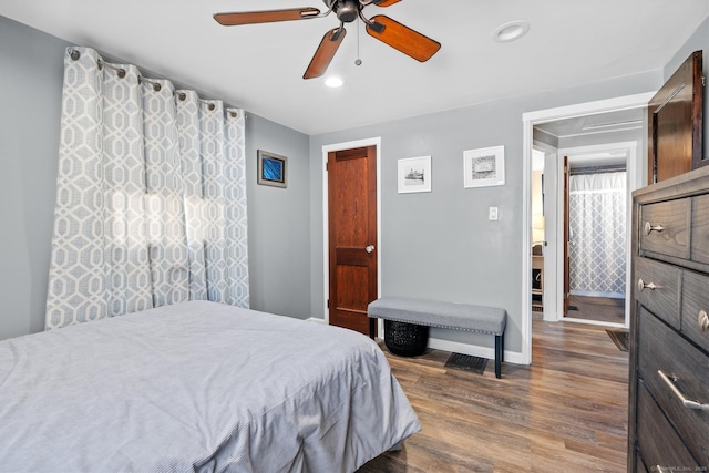 bedroom with recessed lighting, baseboards, wood finished floors, and ceiling fan