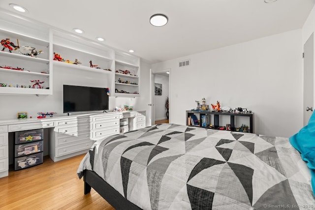 bedroom featuring recessed lighting, visible vents, and light wood-style flooring