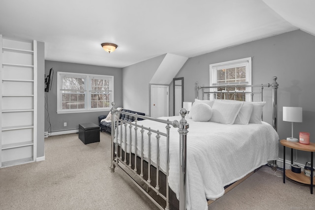 bedroom with vaulted ceiling, baseboards, carpet, and a baseboard radiator