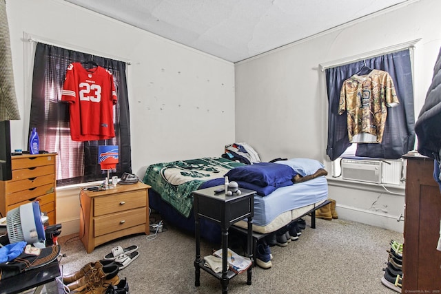 carpeted bedroom featuring cooling unit