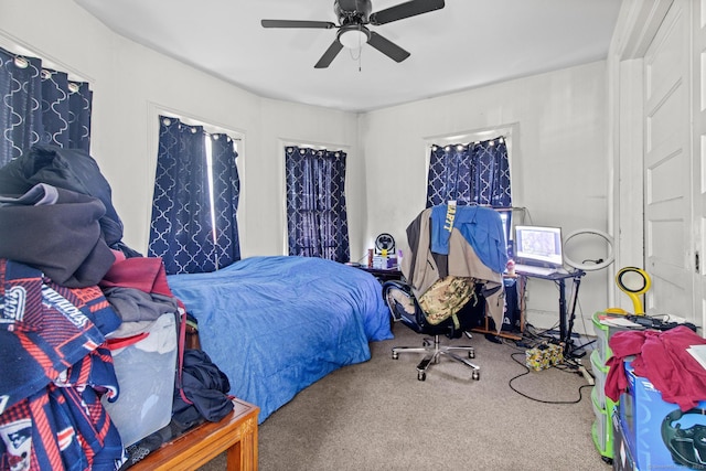 bedroom featuring carpet flooring and a ceiling fan