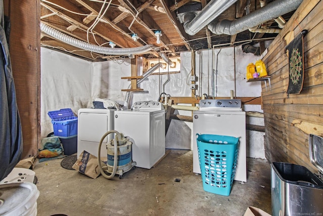 unfinished basement with independent washer and dryer