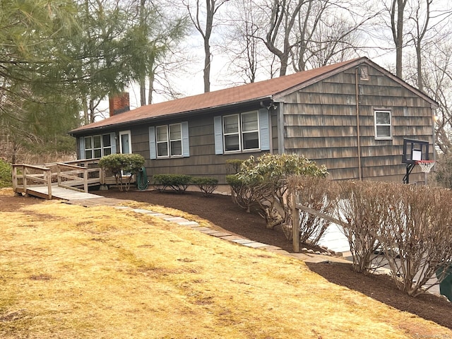 view of front of house with a chimney