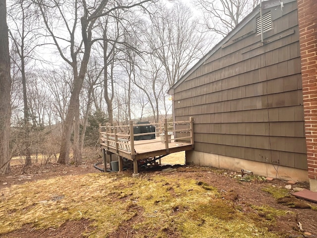 view of yard with a wooden deck