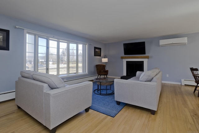 living room with a wall mounted air conditioner, light wood-style floors, a fireplace, a baseboard radiator, and baseboards