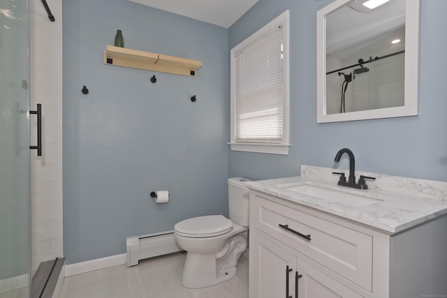 bathroom featuring vanity, baseboards, a tile shower, a baseboard heating unit, and toilet