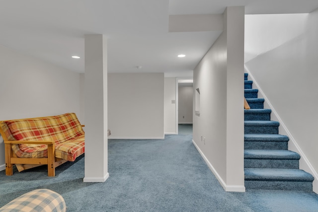 living area featuring carpet flooring, recessed lighting, stairs, and baseboards