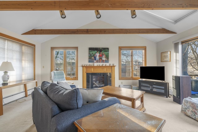 living area featuring baseboard heating, light colored carpet, vaulted ceiling with beams, and a glass covered fireplace