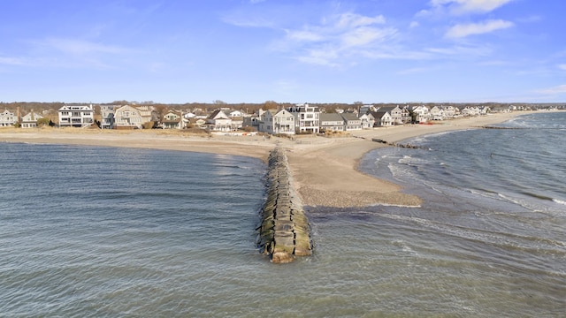 property view of water featuring a beach view and a residential view