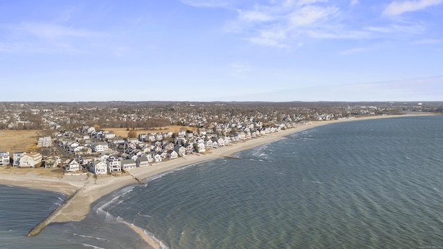 bird's eye view featuring a view of the beach and a water view