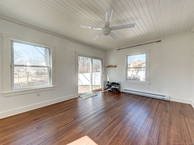 empty room featuring a baseboard heating unit, dark wood-style floors, baseboards, and ceiling fan