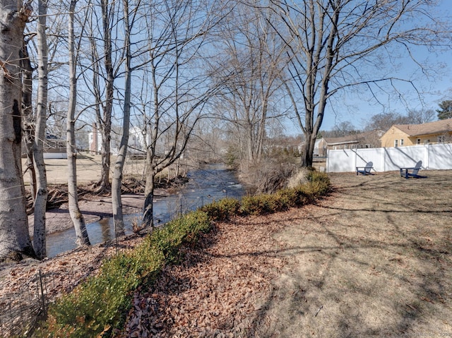 view of yard with fence