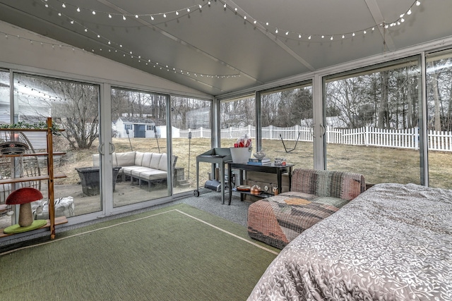 sunroom with lofted ceiling