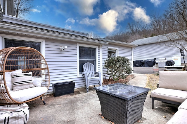 view of patio / terrace featuring a fire pit