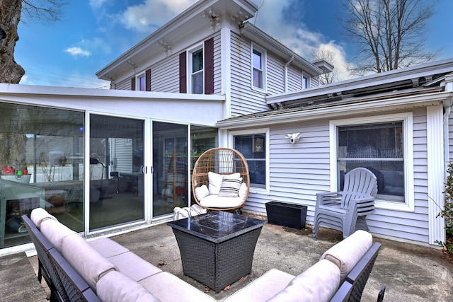 view of patio / terrace with a sunroom