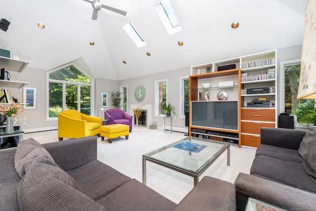 living room with high vaulted ceiling, recessed lighting, a skylight, a baseboard radiator, and light colored carpet