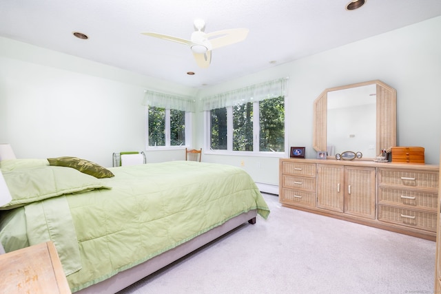 47 Jeremy River Dr, Colchester, CT 06415 - bedroom with light carpet, a baseboard radiator, a ceiling fan, and recessed lighting