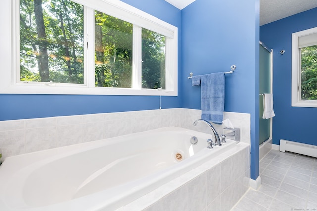 full bathroom featuring tile patterned flooring, a baseboard heating unit, a shower with shower door, a bath, and a textured ceiling