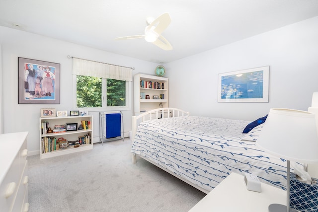 bedroom with carpet floors and a ceiling fan