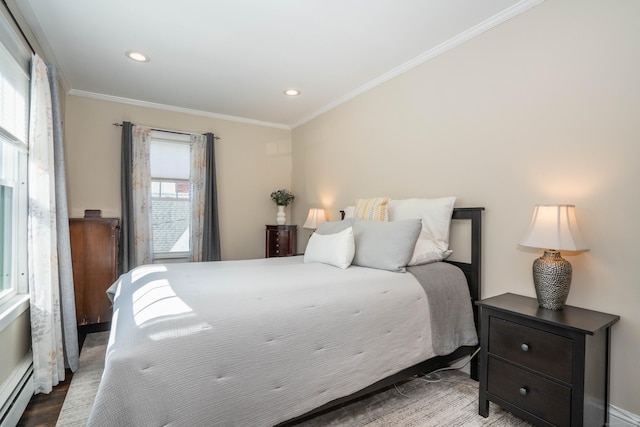 bedroom featuring recessed lighting, crown molding, a baseboard heating unit, and wood finished floors