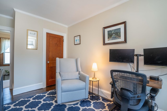 office area featuring wood finished floors, baseboards, and ornamental molding