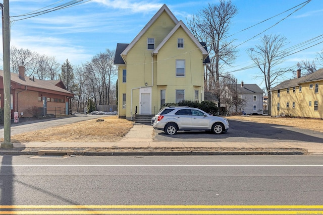 view of front of property with entry steps