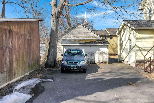 garage with driveway