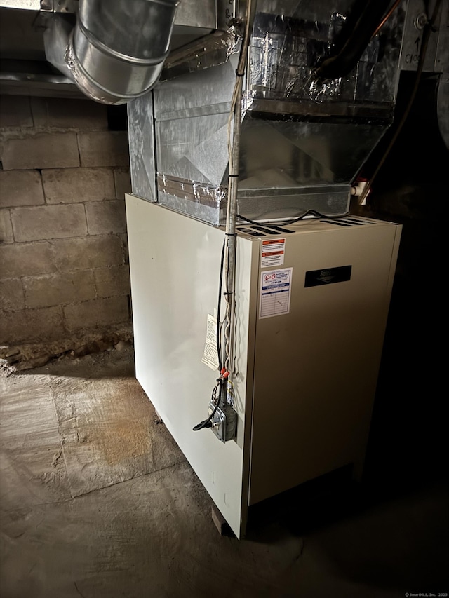 utility room with heating unit