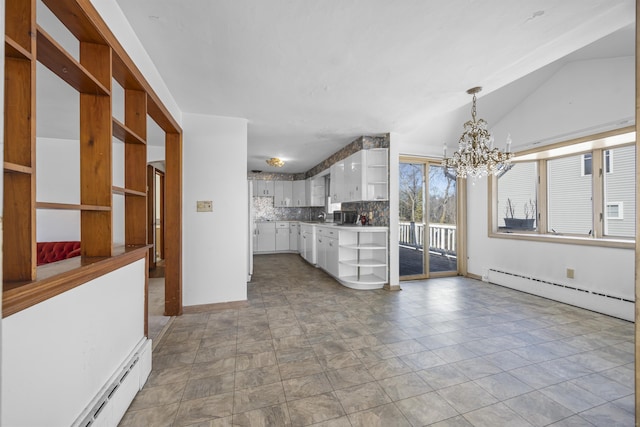 kitchen with backsplash, white cabinets, a baseboard radiator, and open shelves