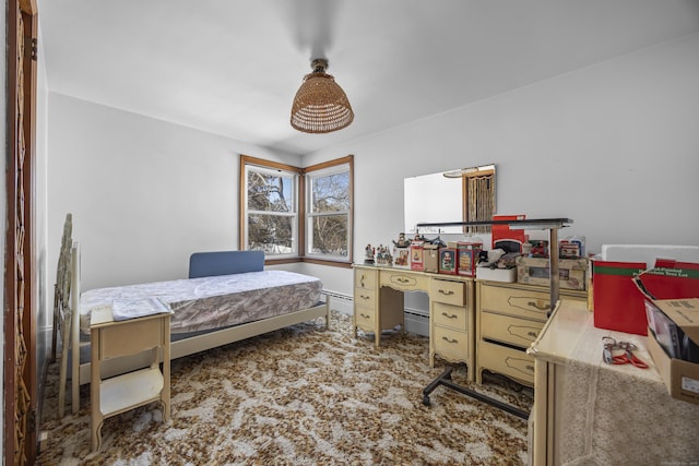 carpeted bedroom featuring a baseboard radiator and a baseboard heating unit