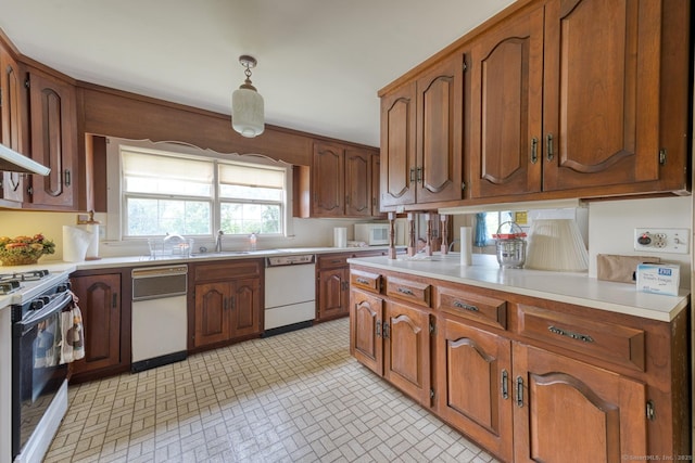 673 Spring St, Manchester, CT 06040 - kitchen featuring white appliances, light countertops, and brown cabinetry