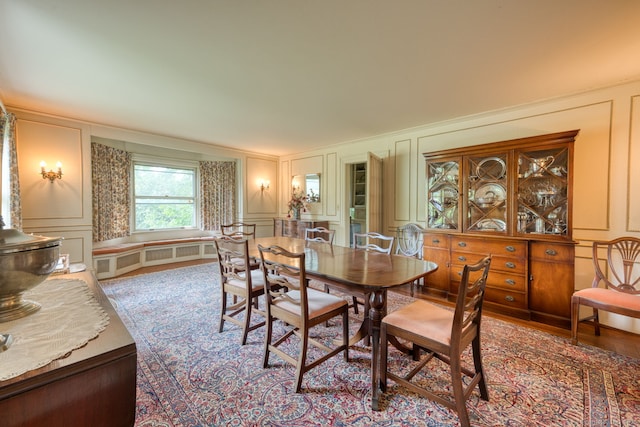 673 Spring St, Manchester, CT 06040 - dining room with a decorative wall