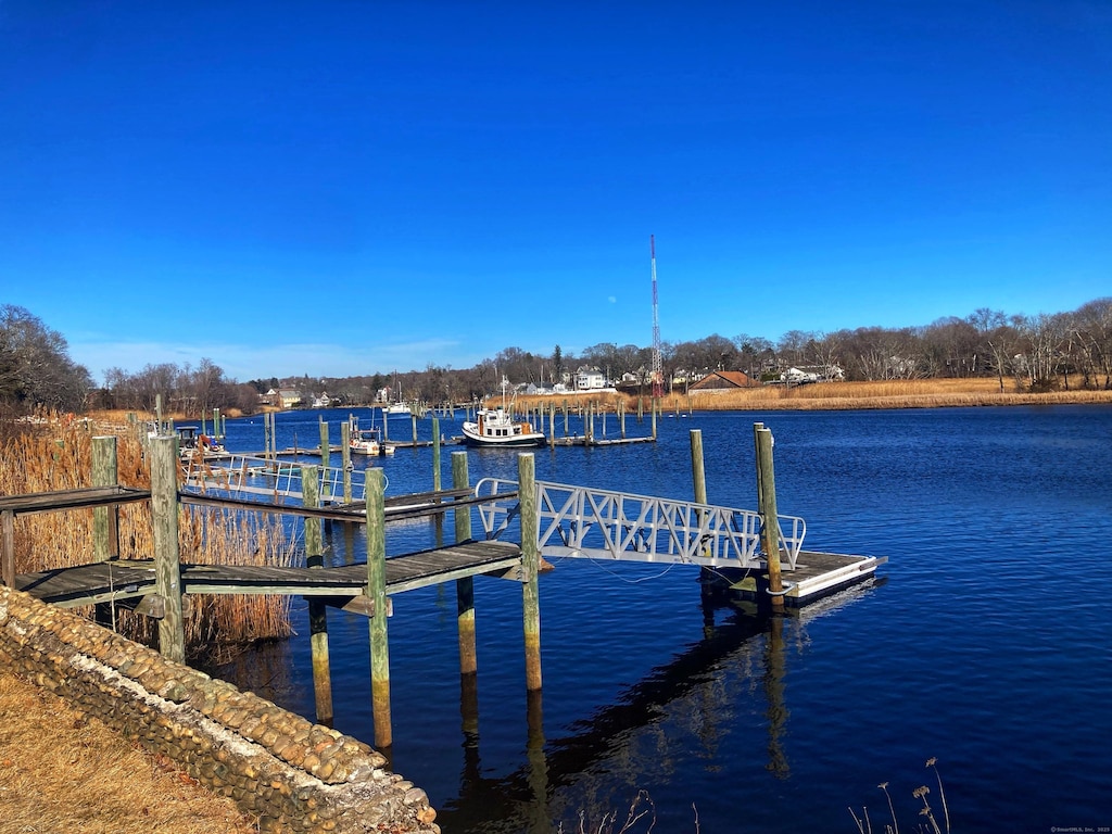 view of dock with a water view