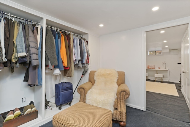 living area featuring carpet flooring and recessed lighting