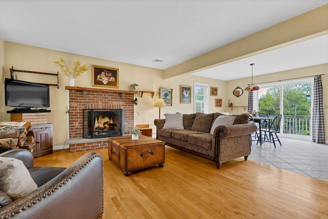686 W Rd, Salem, CT 06420 - living room with a fireplace and light wood finished floors
